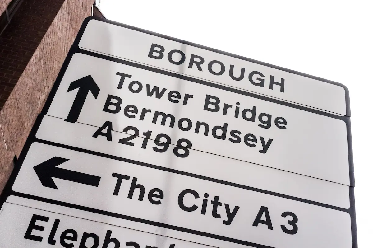 A Borough road sign pointing to Tower Bridge, Bermondsey and the City
